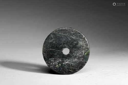 AN ARCHAIC JADE DISC