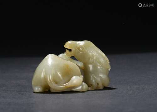 A CELADON JADE CARVING OF HORSE