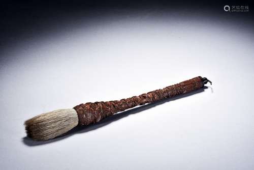 A WOOD CARVED 'DRAGON' BRUSH