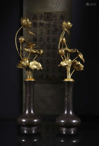a pair of copper and gold flower ornament