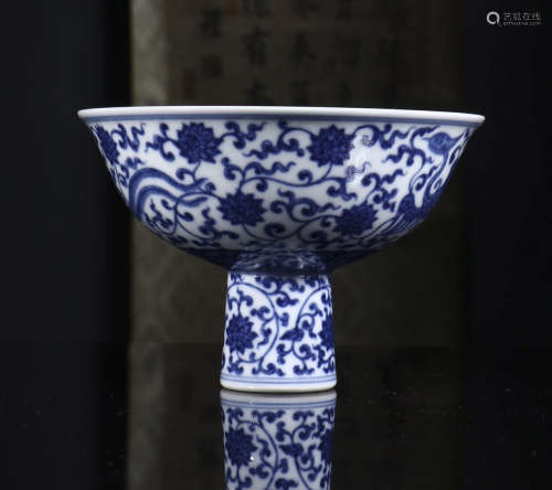 Blue and white phoenix wearing peony high bowl from Qianlong year system