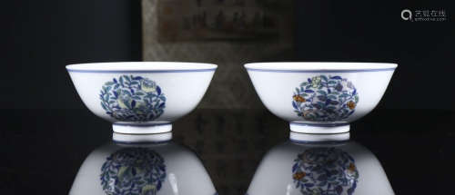 a pair of bowl with colorful flower grains