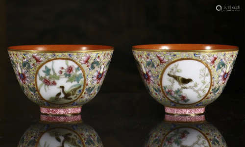 a pair of bowls inlaiding flowers and birds
