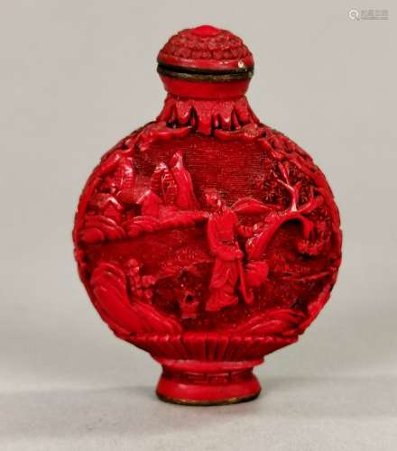 CHINESE CARVED CINNABAR SNUFF BOTTLE