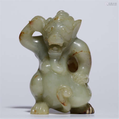 A CHINESE HETIAN GREEN AND WHITE BEAR TABLE ITEM