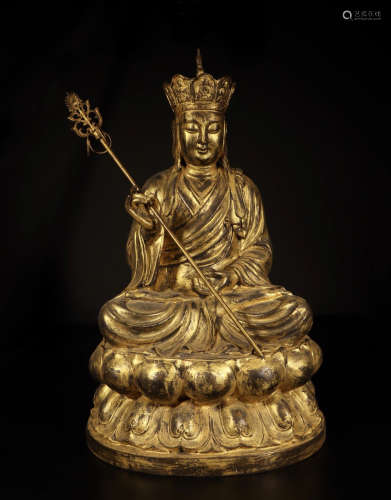 A CHINESE GILT BRONZE SEATED GUANYIN