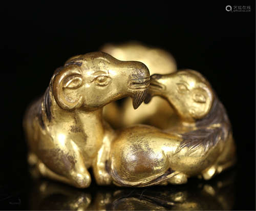 A CHINESE GILT BRONZE SHEEP PAPER WEIGHT