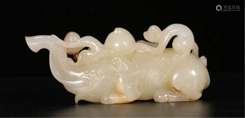 A CHINESE HETIAN JADE ELEPHANT UNDER MONKEY TABLE ITEM