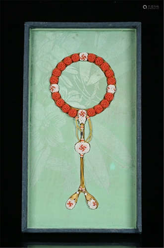 A CHINESE RED CORAL EIGHTEEN BEADS BRACELET