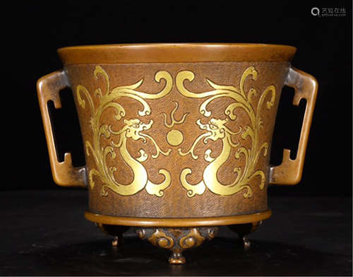 A CHINESE BRONZE GILT GOLD TRIPLE FEET CENSER