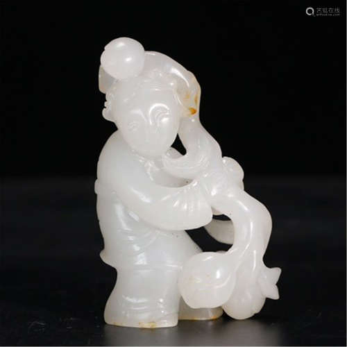 A CHINESE HETIAN JADE BOY TABLE ITEM