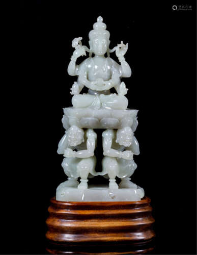 A CHINESE HETIAN JADE SEATED GUANYIN