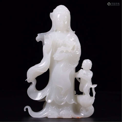 A CHINESE HETIAN JADE GUANYIN AND BOY TABLE ITEM