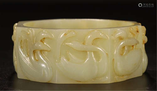 A CHINESE HETIAN WHITE JADE SWAN BANGLE