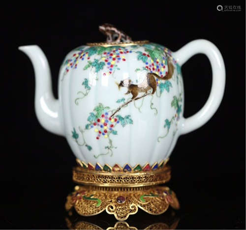 A CHINESE PORCELAIN FAMILLE ROSE FLOWER MELON KETTLE