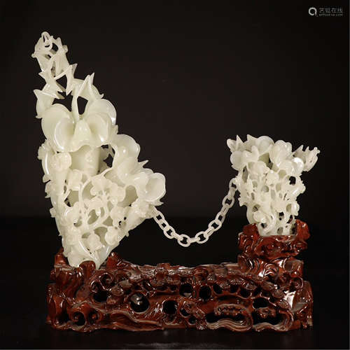 A CHINESE HETIAN WHITE JADE FLOWER AND INSECT TABLE ITEM