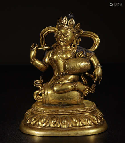 A CHINESE GILT BRONZE DRUMMING BUDDHIST GUANYIN