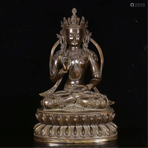 A CHINESE BRONZE BUDDHIST SEATED GUANYIN WITH LOTUS