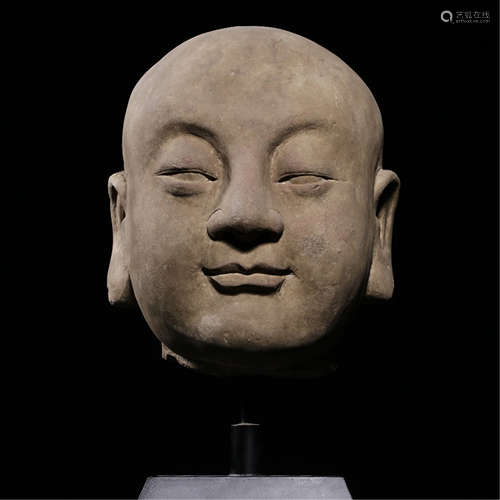 A CHINESE STONE LOHAN HEAD