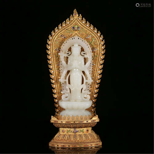 A CHINESE GILT SILVER HETIAN JADE SIX ARMS STAND GUANYIN WITH LOTUS