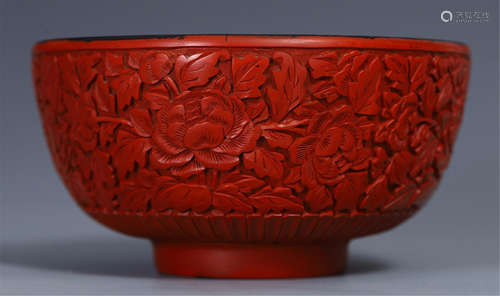 A CHINESE CINNABAR FLOWER BOWL