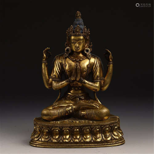 A CHINESE GILT BRONZE WITH FOUR ARMS BUDDHIST GUANYIN