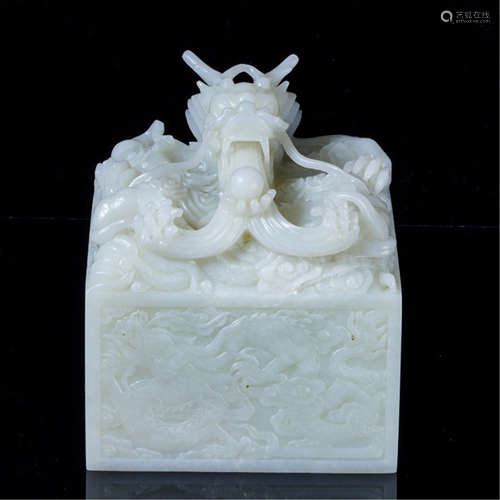 A CHINESE HETIAN WHITE JADE DRAGON SEAL