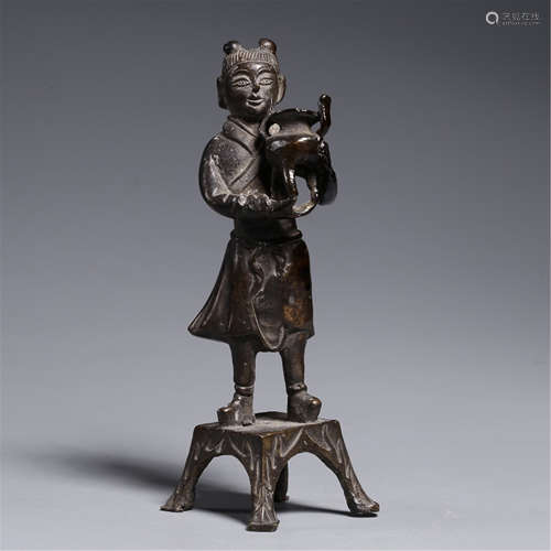 A CHINESE GILT BRONZE BOY SEATED TABLE ITEM