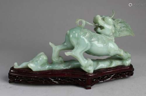 A Chinese Carved Jade Qilin Statue with Stand