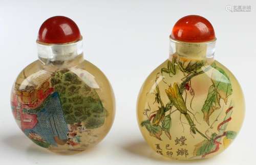 A Group of Two Peking Glass Snuff Bottles