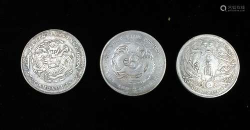 A Group of Three Coins