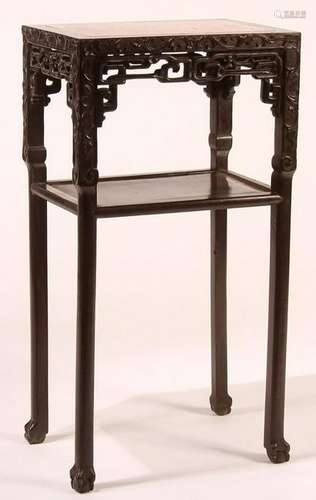 A CHINESE EXPORT CARVED HARDWOOD AND MARBLE STAND,