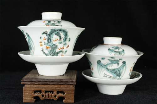 A Pair of Chinese Famille-Rose Porcelain Tea Bowls with Covers and Plates
