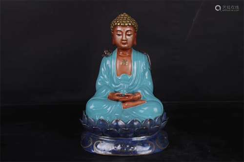 A Chinese Turquoise-Green Glazed Porcelain Figure of Buddha