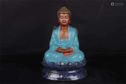 A Chinese Turquoise-Green Glazed Porcelain Figure of Buddha
