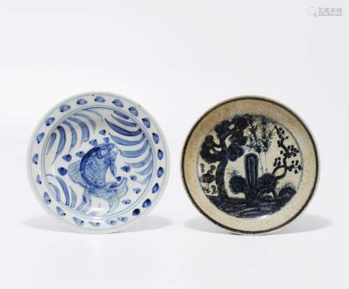 A SET OF BLUE AND WHITE PLATES