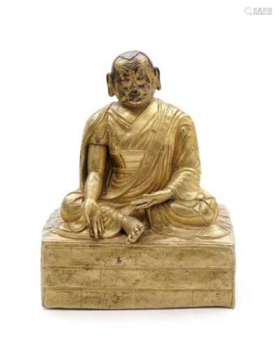 Lama assis, sculpture en alliage de cuivre doré et repoussé, Tibet, XVII-XVIIIe s., [...]