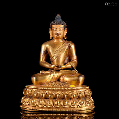 A Chinese Gilt Bronze Buddha