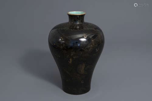A Chinese black ground meiping vase with a gilt dragon chasing the pearl, Qianlong mark, 19th C.