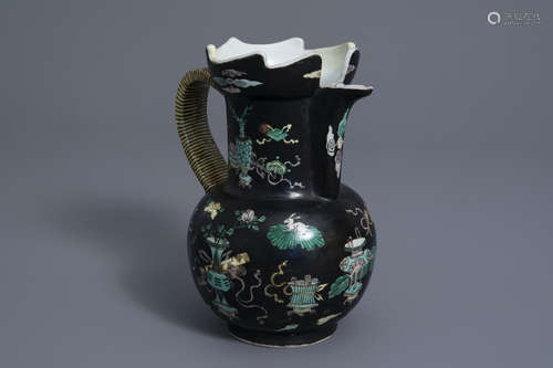 A Chinese famille noire jug with antiquities design, Kangxi mark, 19th C.