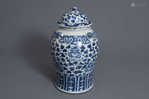 A Chinese blue and white vase and cover with floral design, 19th C.