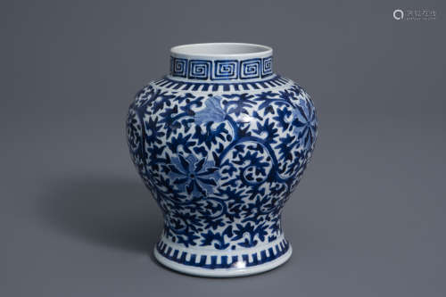 A Chinese blue and white baluster vase with floral design, Kangxi mark, 19th C.