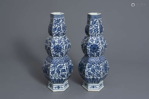 A pair of Chinese blue and white hexagonal triple gourd vases with floral design, 19th C.