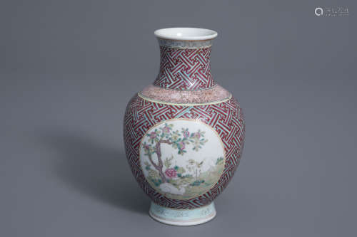 A Chinese famille rose 'hu' vase with goats, Qianlong mark, 19th/20th C.