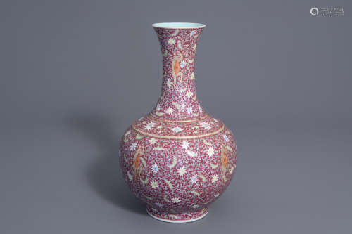 A Chinese famille rose red-pink ground bottle vase, Qianlong mark, 19th/20th C.