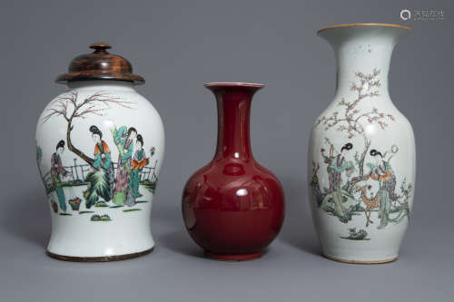 Two Chinese famille rose vases and a red ground vase, 19th/20th C. and 20th C.