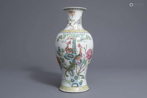 A Chinese famille rose 'two phoenixes' baluster vase, Qianlong mark, 19th/20th C.