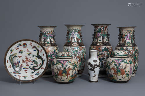A collection of Chinese Nanking crackle glazed famille rose vases, ginger jars and a dish, 19th and 20th C.