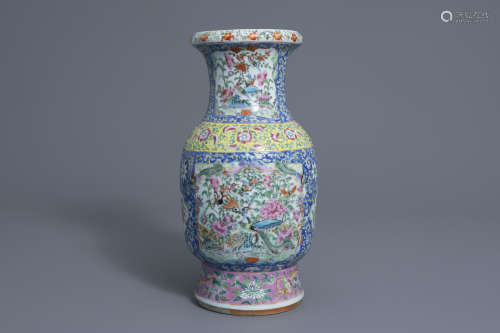 A Chinese Canton famille rose baluster vase with floral design, 19th C.