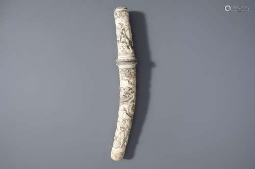 A Japanese ivory carved tanto with a hunting scene, Meiji, 19th/20th C.